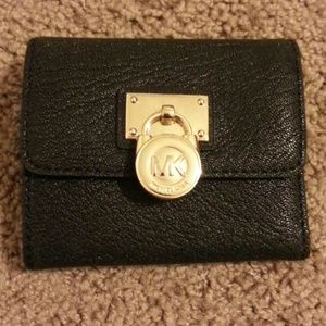 TRADED ..Michael kors Hamilton small flap wallet