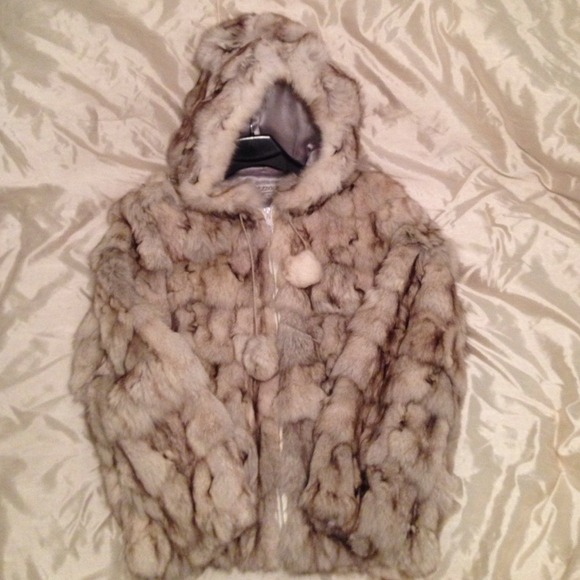 100% Authentic angora fur coat never worn
