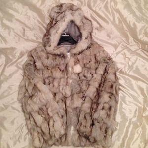 100% Authentic angora fur coat never worn