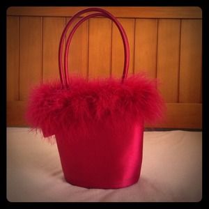 Hot pink purse with feather