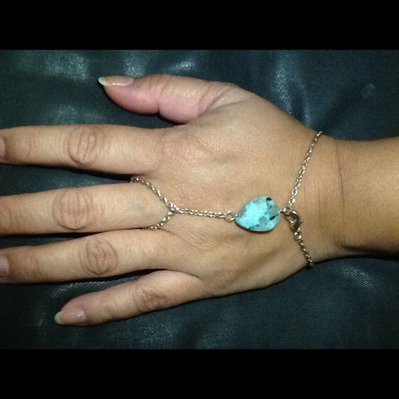 Ring bracelet with teal stone