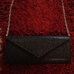 Cute black glitter clutch purse never used!