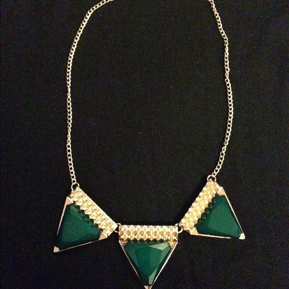 Gold and emerald statement piece