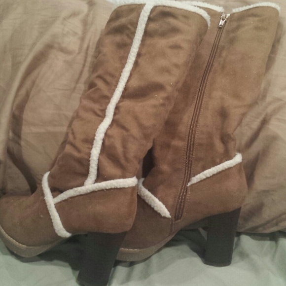 Brown boots trimmed in cream