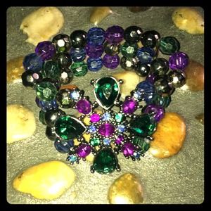 Funky teal and purple cuff.