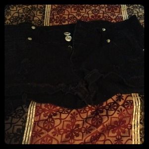 Black distressed shorts