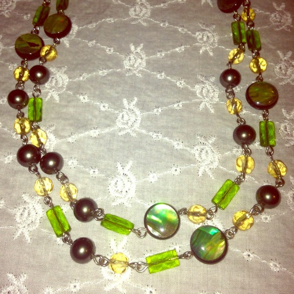 #174. A long necklace in greens and warm yellows