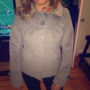 Grey short pea coat with cute detailing.