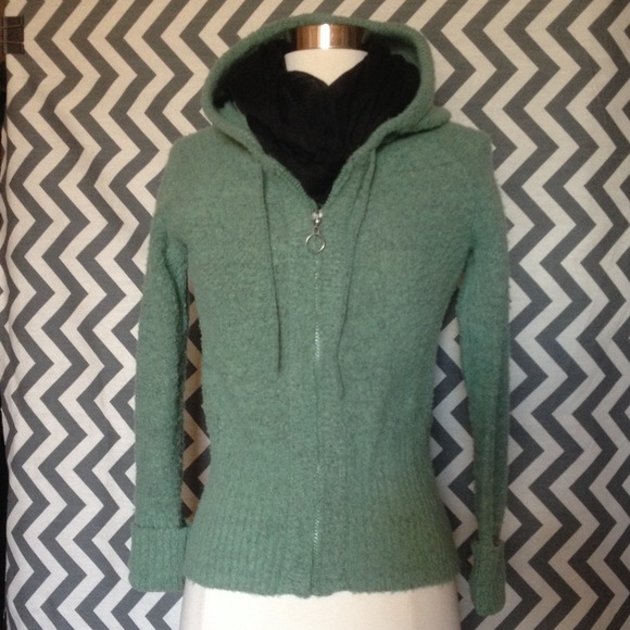 Dark mint colored zip hoodie.