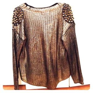 Oversized gold sweater w/ spiked leather shoulders