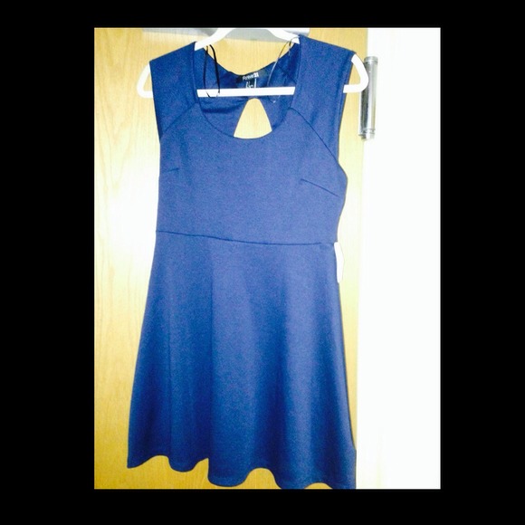 Navy blue cut out dress, never won!