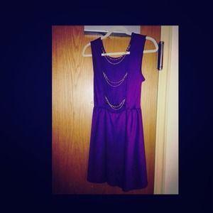 Purple dress with gold chained back!