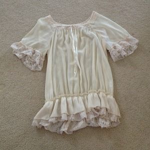 ***SOLD in bundle.** Sheer lace trimmed blouse