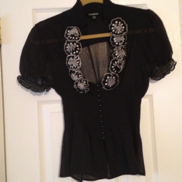 Bebe Black sheer top with flower detail