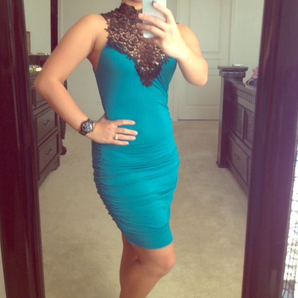 Blue fitted dress with black lace details - Picture 1 of 3