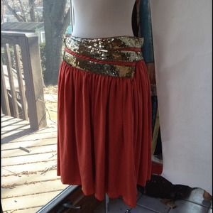 Orange jersey knit and gold sequins wrap skirt