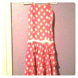 A pink and white  pokadotted dress