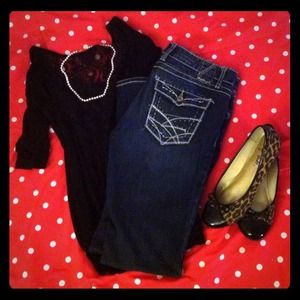 Dark wash boot cut jeans, gems & silver threading.