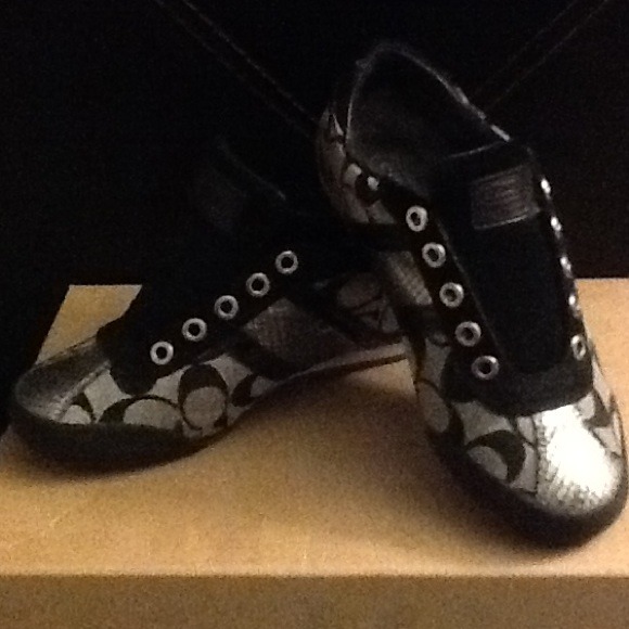 Black, Silver, and Grey Coach shoes