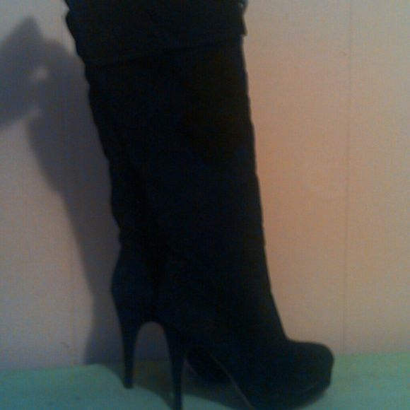 Black boot heels never worn