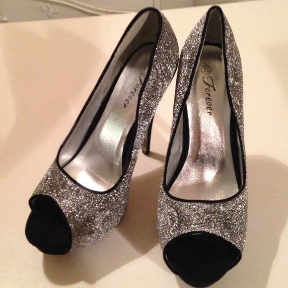 Sliver and  black velvet  pumps new in the box