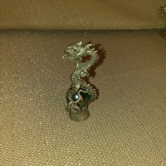 Pewter Dragon sitting on an orb