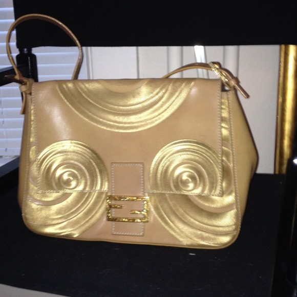 Vintage Fendi purse! Gold Circles and buckles!