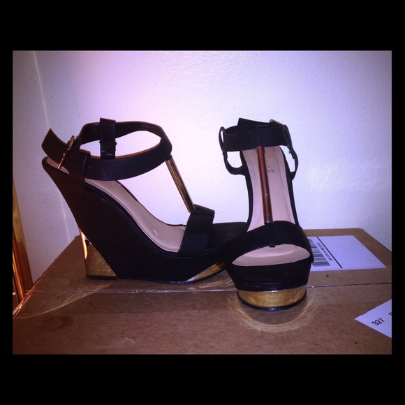 Black wedge heels with gold detail