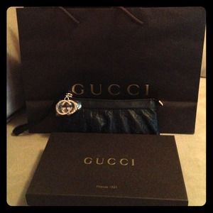 Authentic Gucci Leather guccisima wristlet