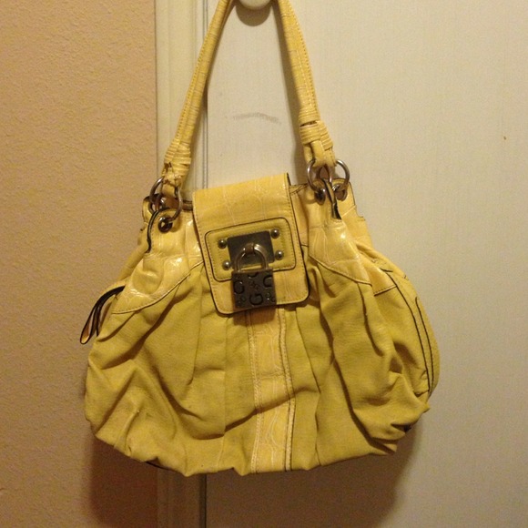 Yellow guess purse