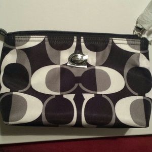 HOLD.      Coach 100% authentic nylon cosmetic bag