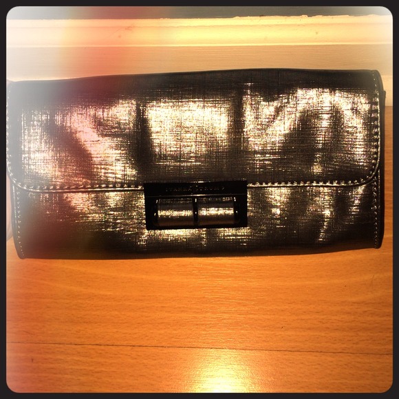 Ivanka Trump metallic clutch