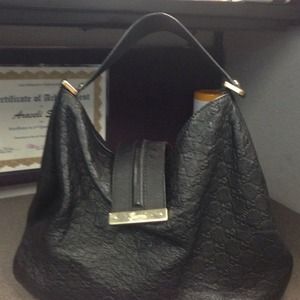 Gucci hobo purse.