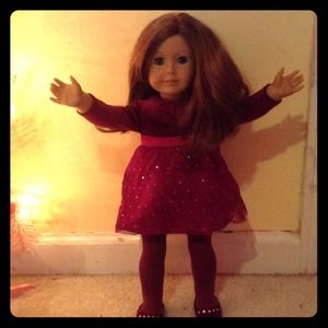 selling an doll with a outfit and cheer outfit