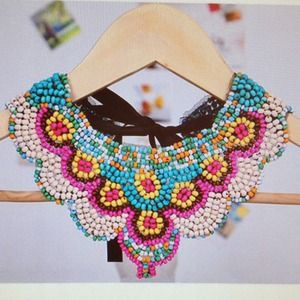 Bohemian style necklace with ribbon.