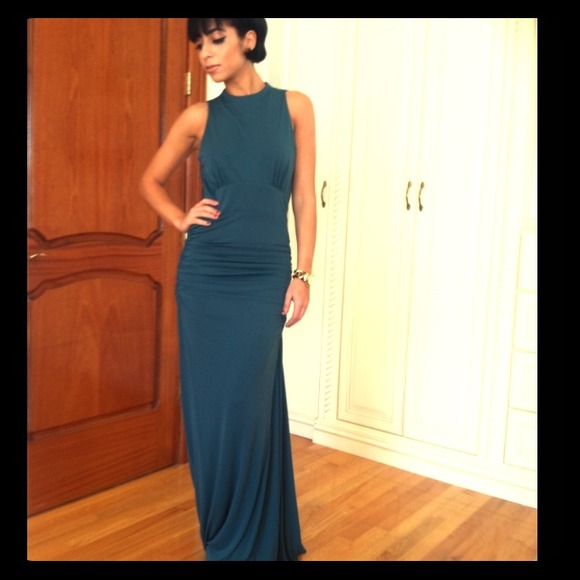 Emerald floor length gown draped back