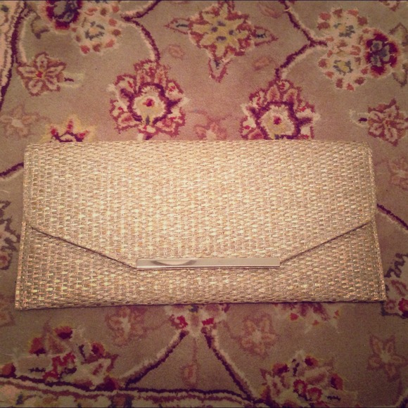 Tan basket weave clutch