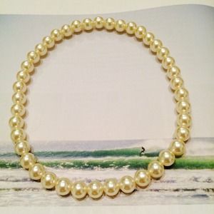 Plastic pearl necklace