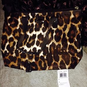 Authentic coach small ocelot print tote.