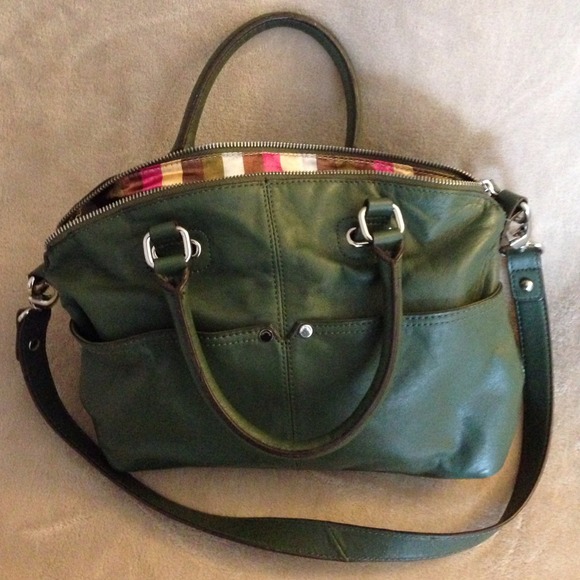 Green leather shoulder purse with short handles.