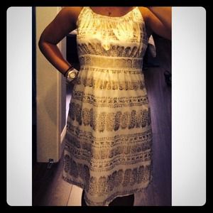 Very cute white and gold dress by Mark.