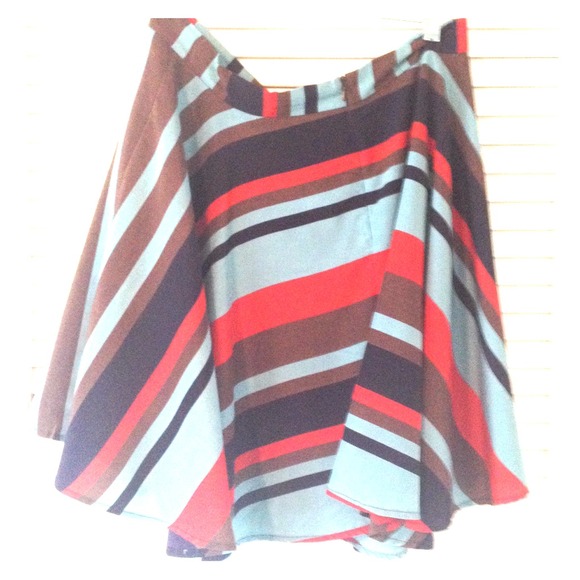 Silk striped a-line skirt. 2 small front pockets.