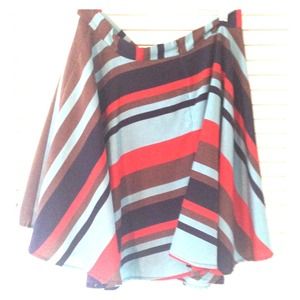 Silk striped a-line skirt. 2 small front pockets.