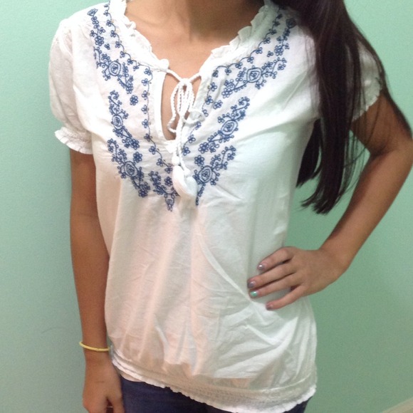Frilly top w/ blue detailing and gold sequins