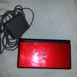 Red and black Nintendo DS Lite