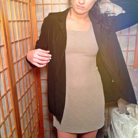 Tan dress, gold pants and triangle necklace