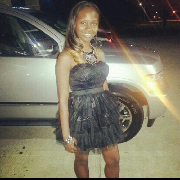 Black strapless dress.