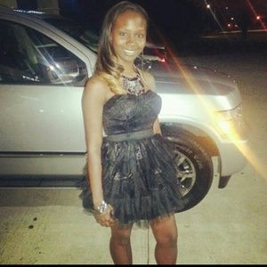 Black strapless dress.