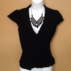 Black shirt sleeve Maurice's sweater