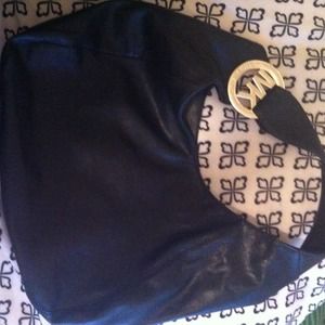 Michael Kors. Big purse.